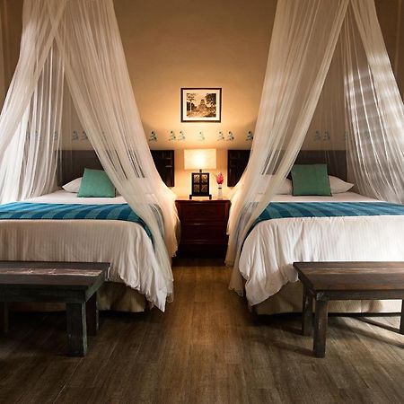 Hotel Jungle Lodge Тикаль Экстерьер фото