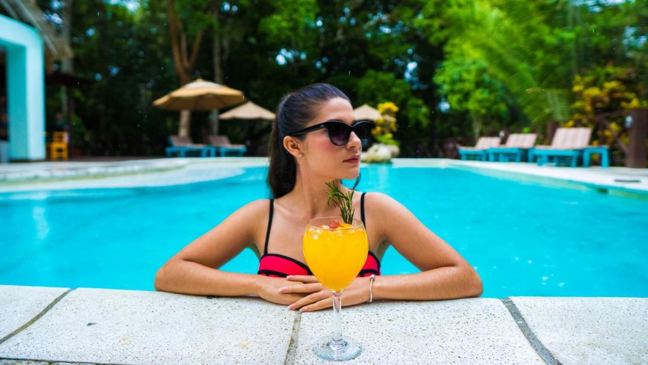 Hotel Jungle Lodge Тикаль Экстерьер фото