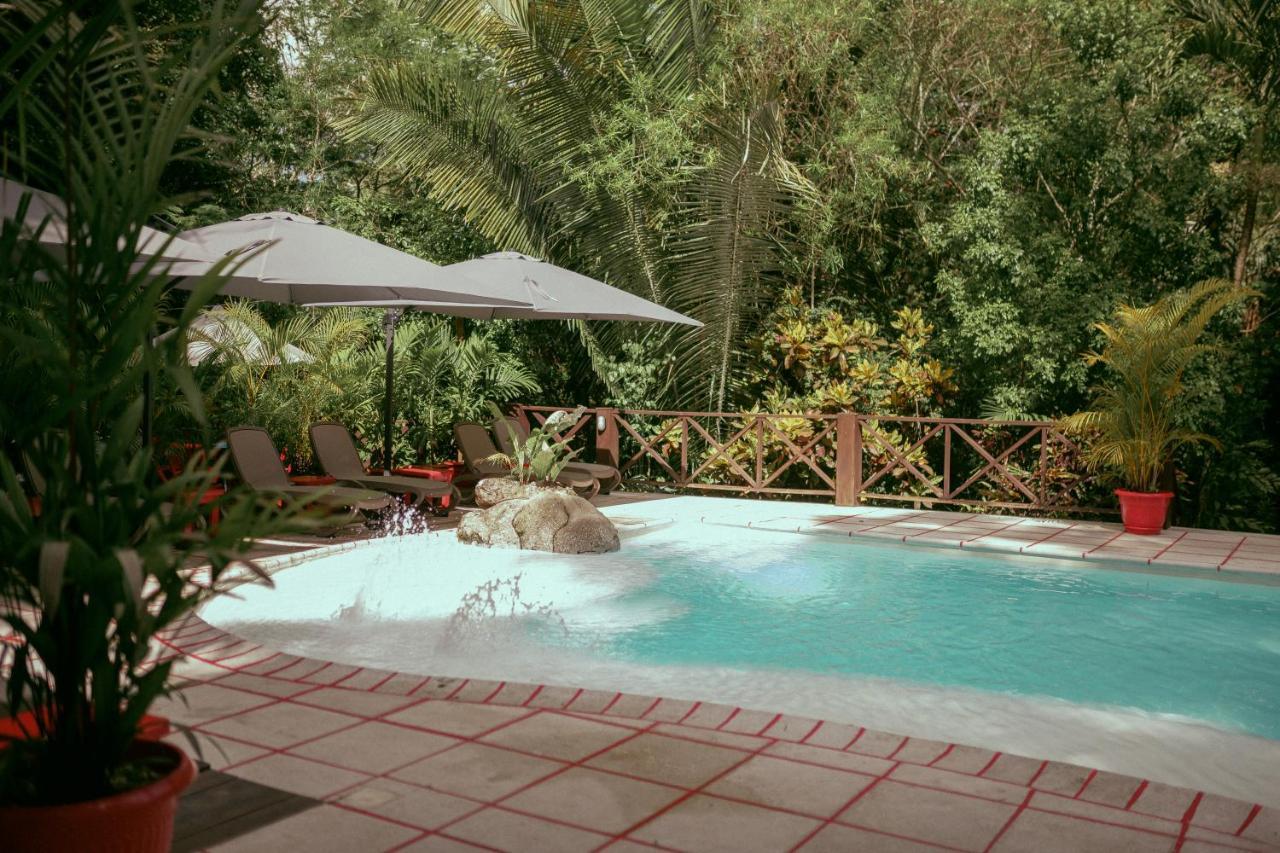 Hotel Jungle Lodge Тикаль Экстерьер фото