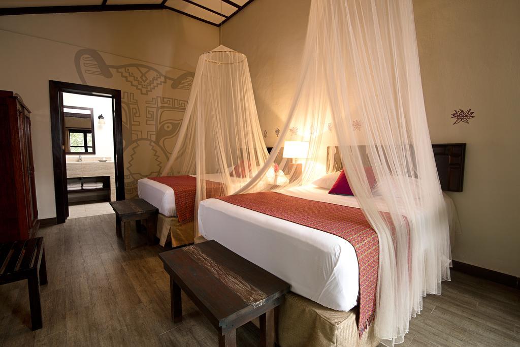 Hotel Jungle Lodge Тикаль Экстерьер фото
