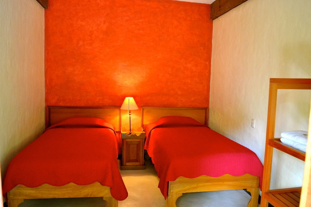 Hotel Jungle Lodge Тикаль Экстерьер фото