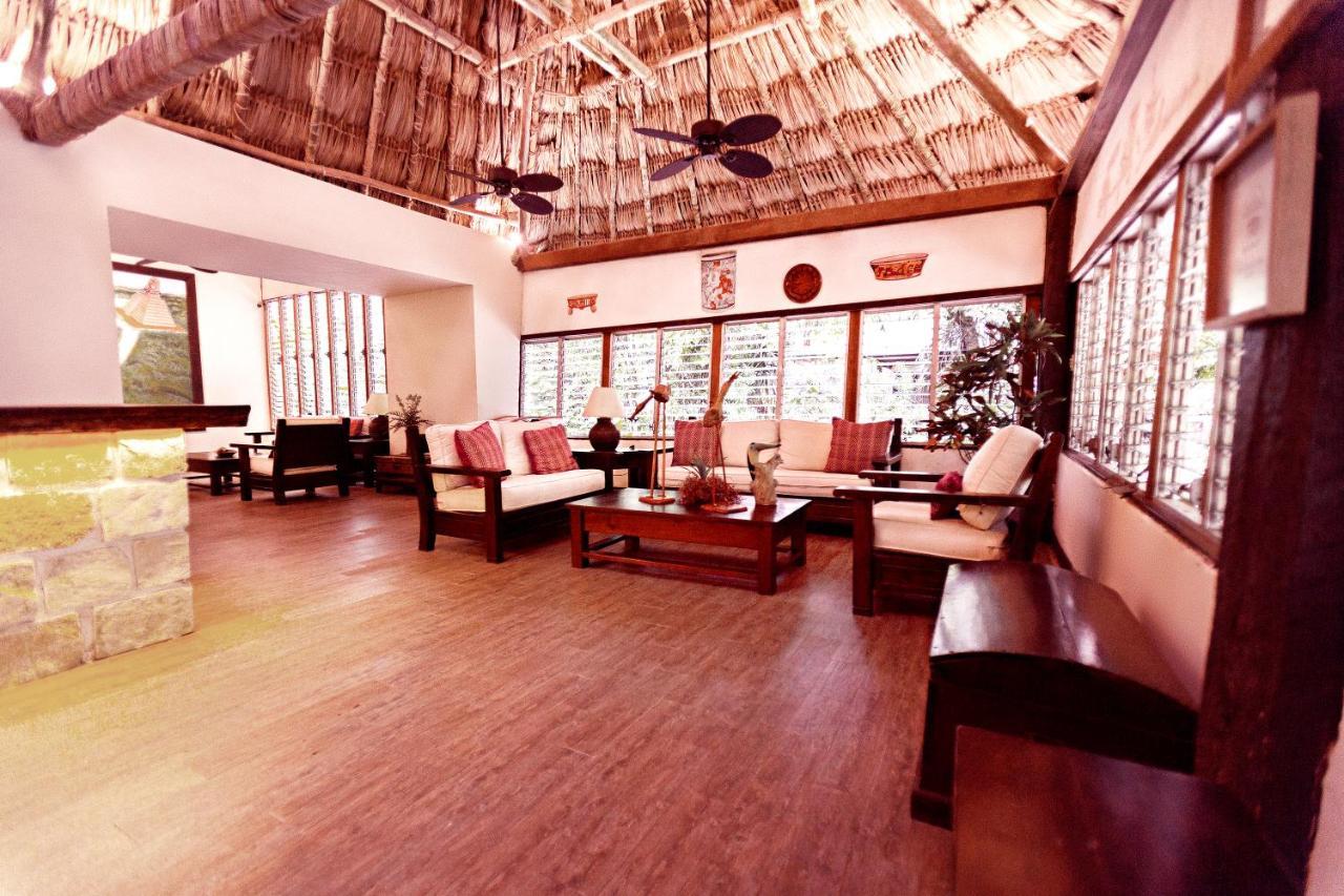 Hotel Jungle Lodge Тикаль Экстерьер фото
