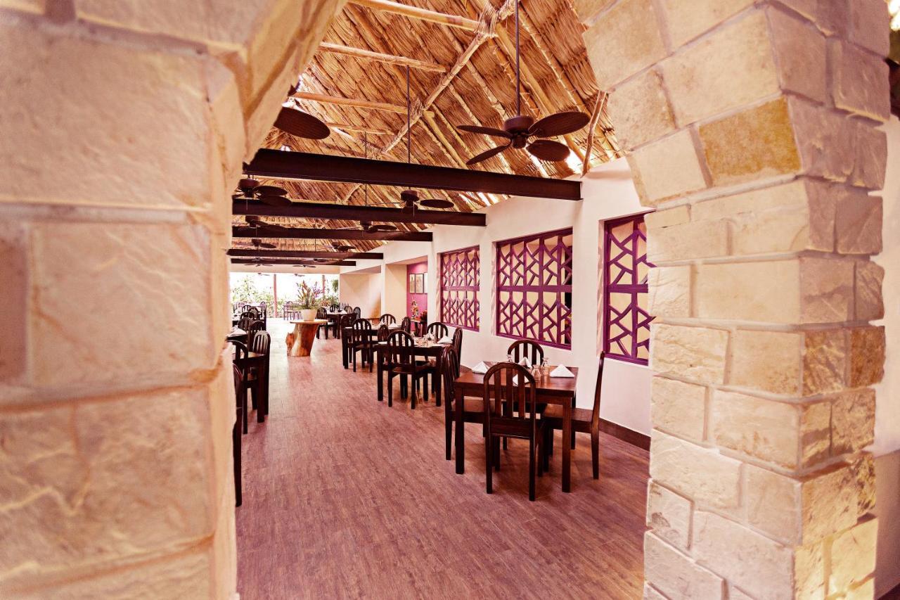 Hotel Jungle Lodge Тикаль Экстерьер фото