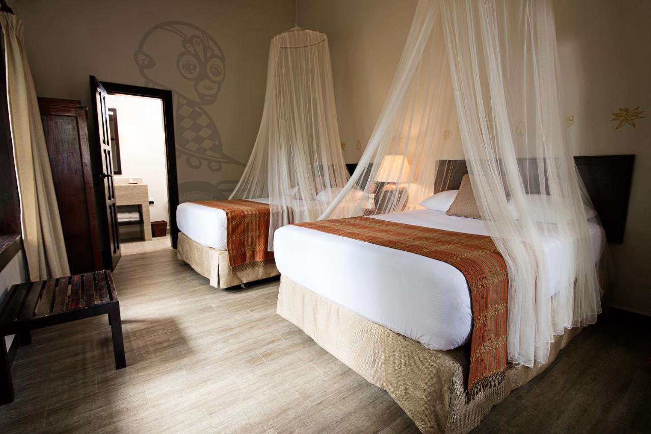 Hotel Jungle Lodge Тикаль Экстерьер фото