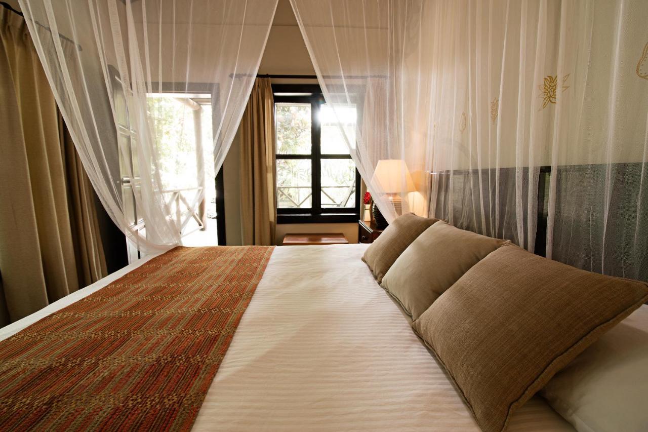 Hotel Jungle Lodge Тикаль Экстерьер фото